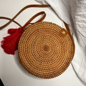 Round crossbody basket bag.